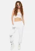 Metallic Butterfly Joggers sold by Dolls Kill
