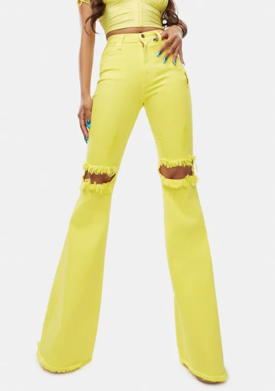 Bright Playful Call Distressed Denim Flares sold by Dolls Kill