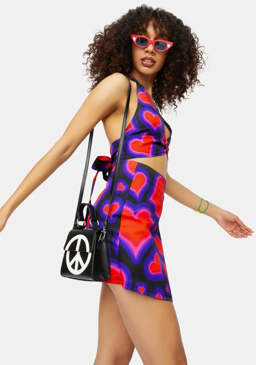 Electric Juice Heart Print Wrap Mini Skirt sold by Dolls Kill product image thumbnail 2