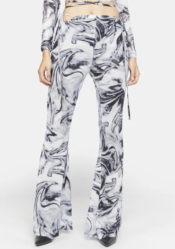 Mesh Swirl Print Cut Out Flare Trousers sold by Dolls Kill