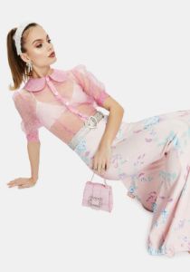 The Marilyn Sheer Polka Dot Blouse sold by Dolls Kill