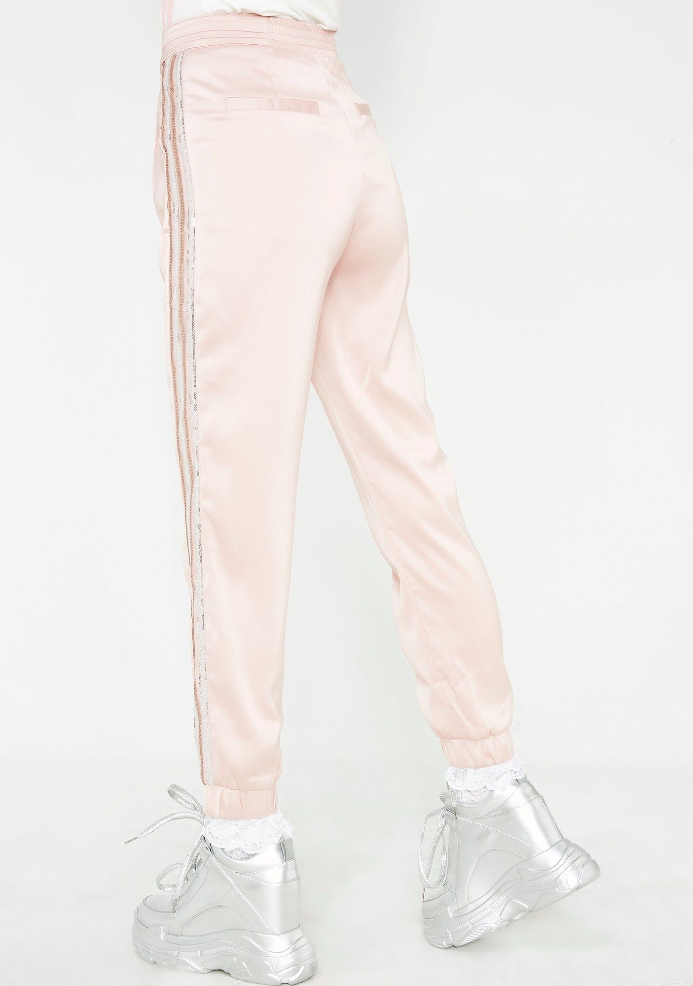 Over Dramatic Satin Joggers sold by Dolls Kill