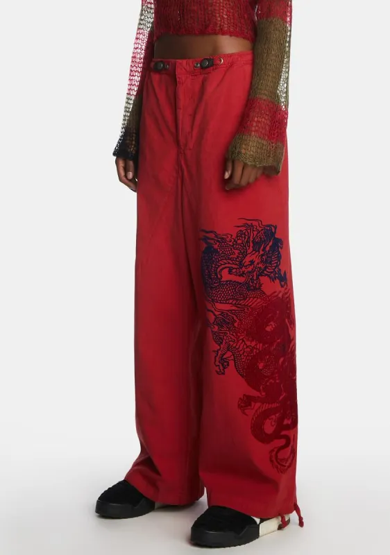 Red NY Dragon Flock Cargo Pants sold by Dolls Kill
