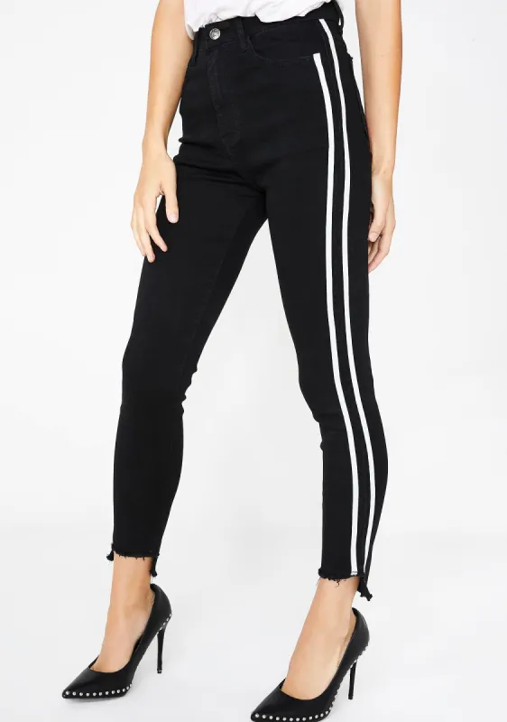 Black Side Stripe Skinny Jeans sold by Dolls Kill