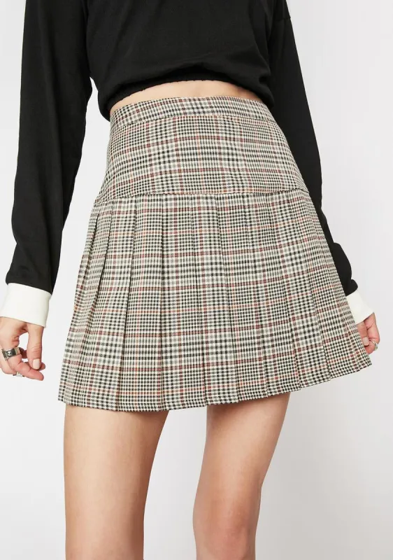 Pleated Plaid Mini Skirt sold by Dolls Kill