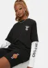 Monster Graphic Tee sold by Dolls Kill