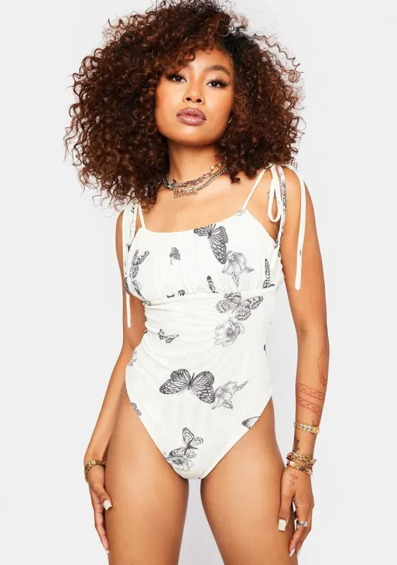 Cream Butterfly Printed Bodysuit sold by Dolls Kill