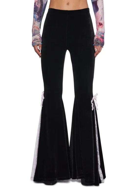 Stroke Of Midnight Velvet Flares sold by Dolls Kill