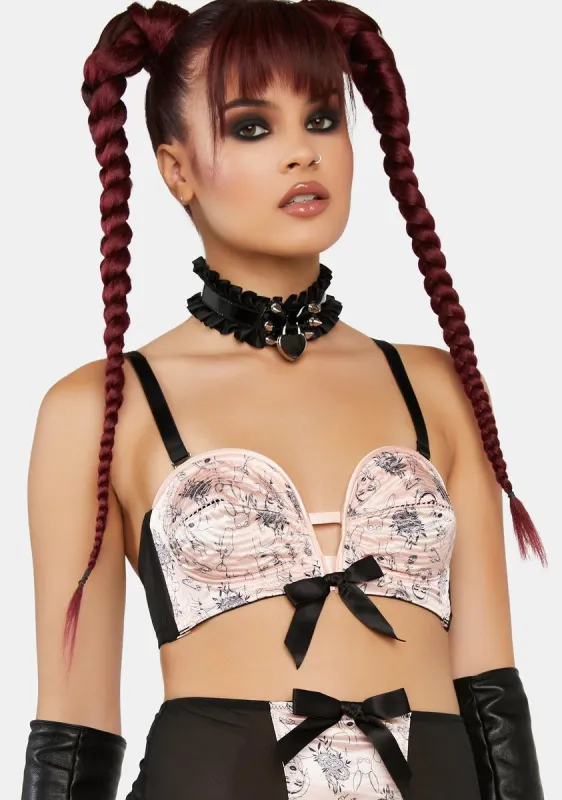 x Bettie Page Tattoo Print Black Overwire Bra sold by Dolls Kill