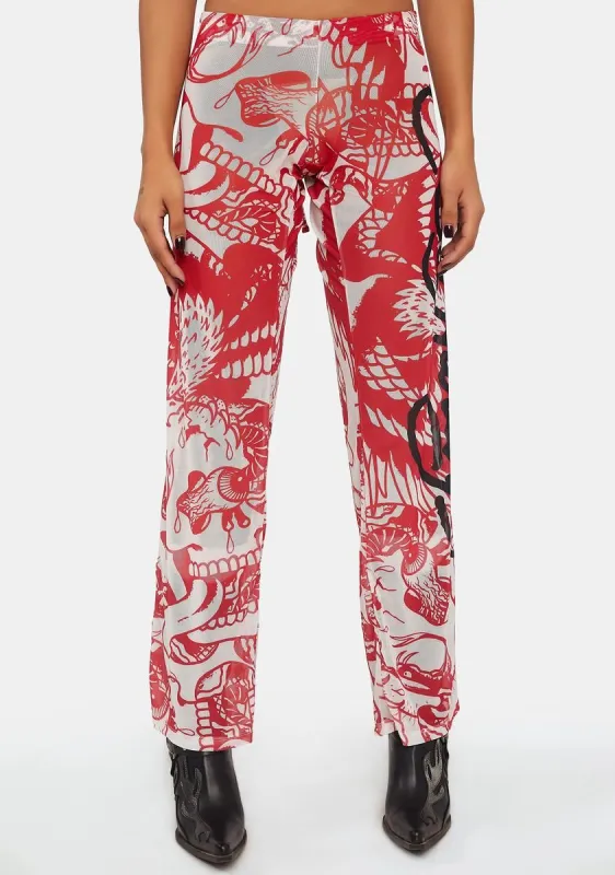 Battle Skull Mesh Flare Pants sold by Dolls Kill