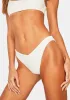 White Enzo Ribbed Bikini Bottoms sold by Dolls Kill