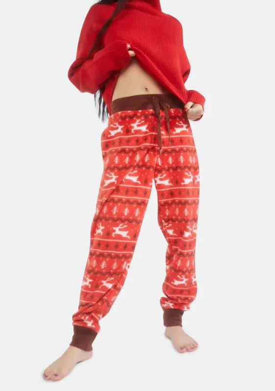 Red Reindeer Joggers sold by Dolls Kill