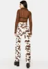 Lift Your Mood Cow Print Jeans sold by Dolls Kill
