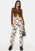 Lift Your Mood Cow Print Jeans sold by Dolls Kill