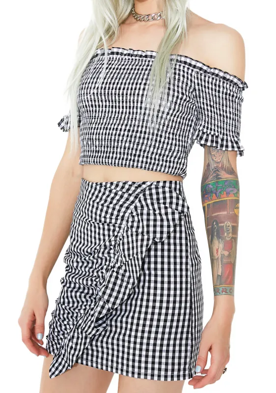 Check Please Ruffle Mini Skirt sold by Dolls Kill