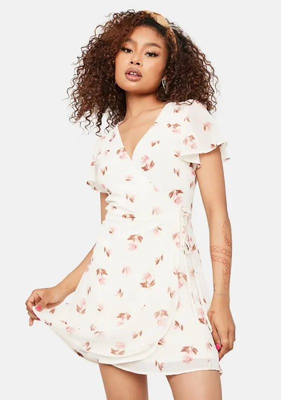 Touch The Sunlight Floral Wrap Mini Dress sold by Dolls Kill
