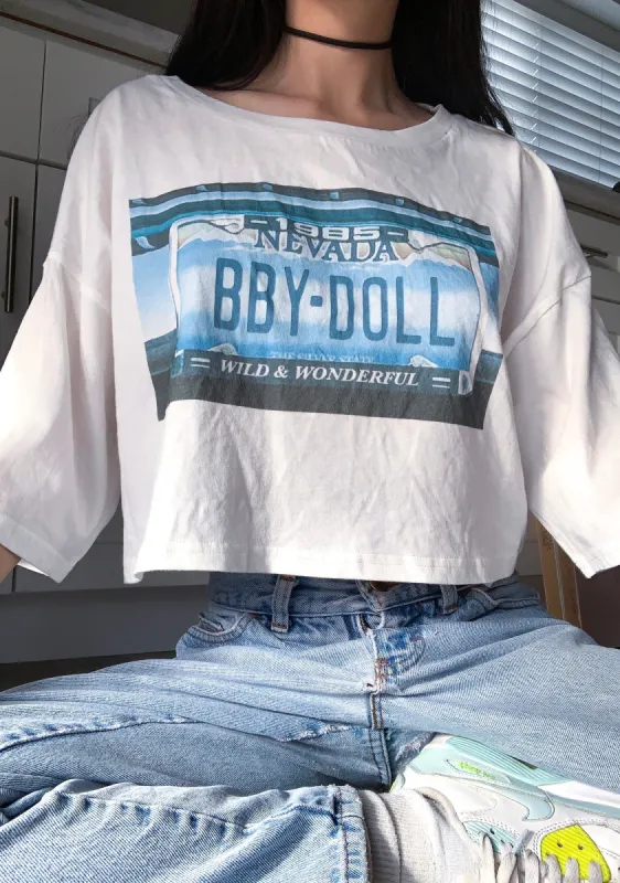 Tailgate Graphic Crop Tee sold by Dolls Kill