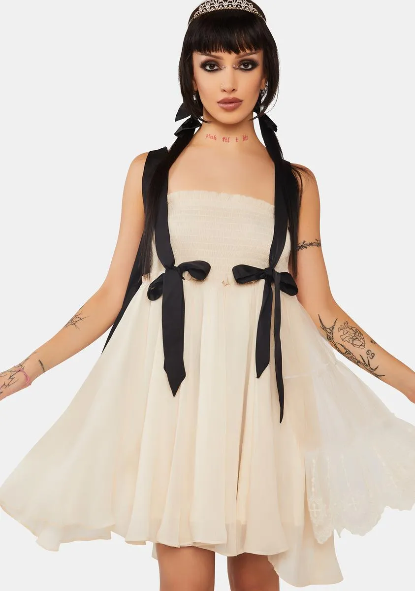 Off White Gothic Multi Bow Dress sold by Dolls Kill