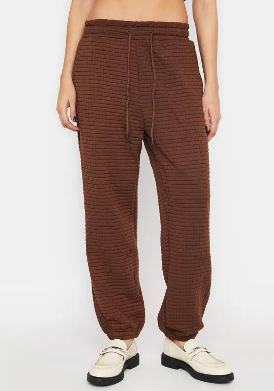 Cocoa Cozy Or Bust Joggers sold by Dolls Kill