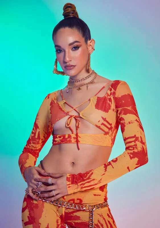 Orange Tonal Ripped Magazine Print Mesh Top sold by Dolls Kill