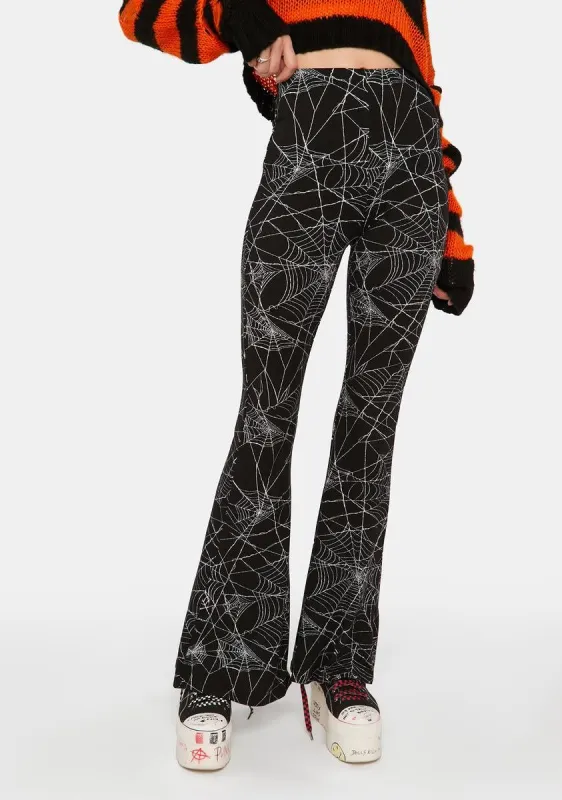 All Caught Up Web Print Pants sold by Dolls Kill