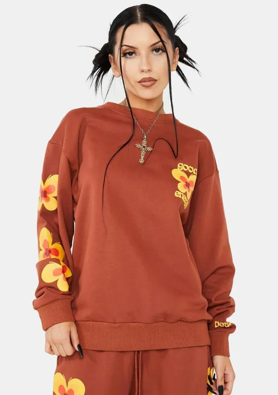 Rust Good Energy Sweatshirt sold by Dolls Kill