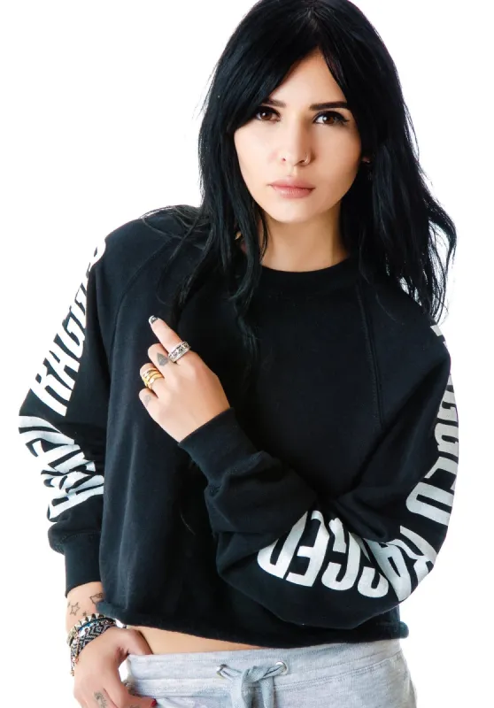 The  Gunshow Long Sleeve Cropped Sweatshirt sold by Dolls Kill