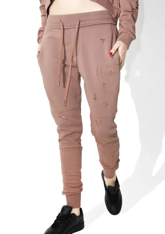 Stretch My Hands Distressed Sweatpants sold by Dolls Kill