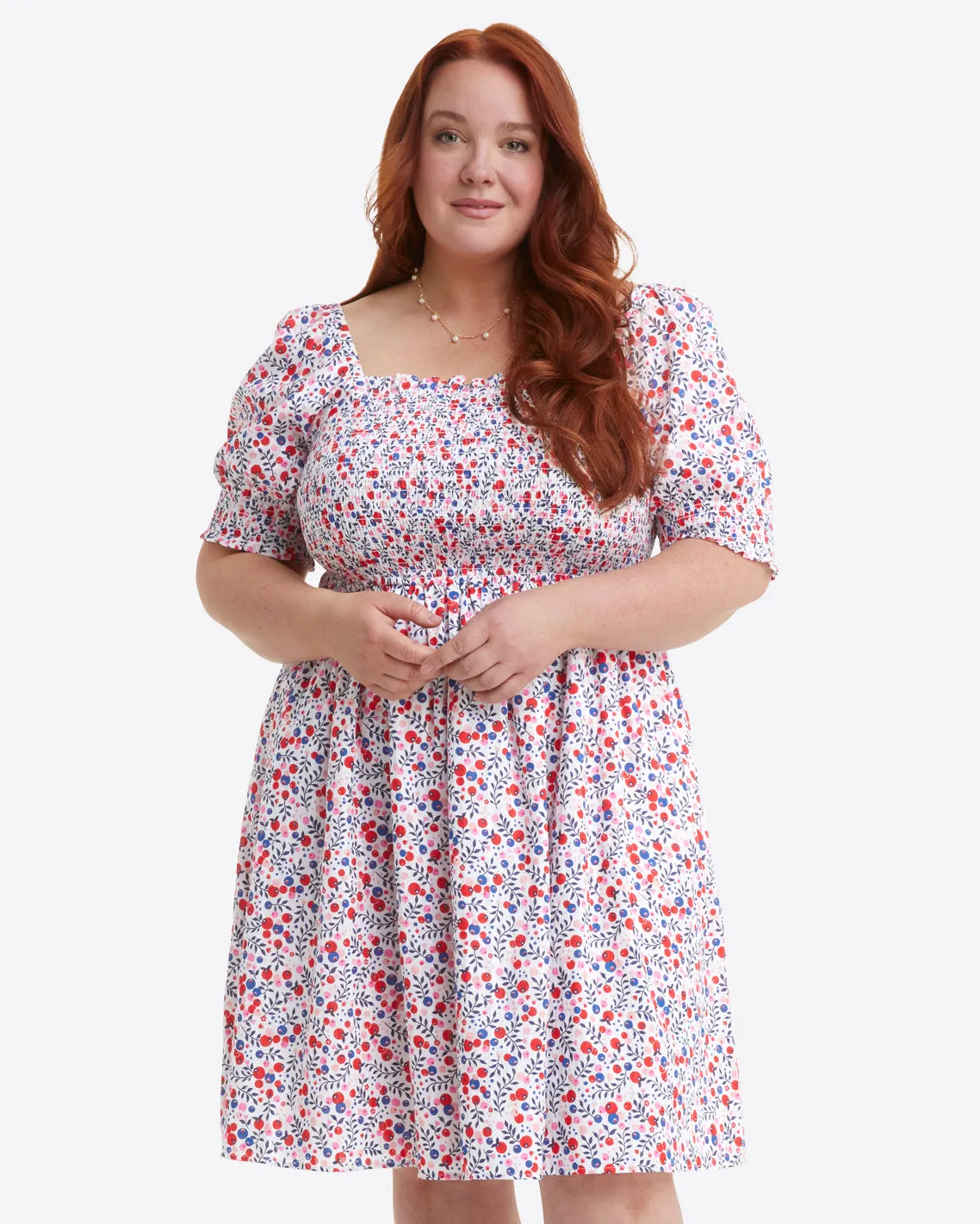 Cam Smocked Dress in Berry Print sold by Draper James