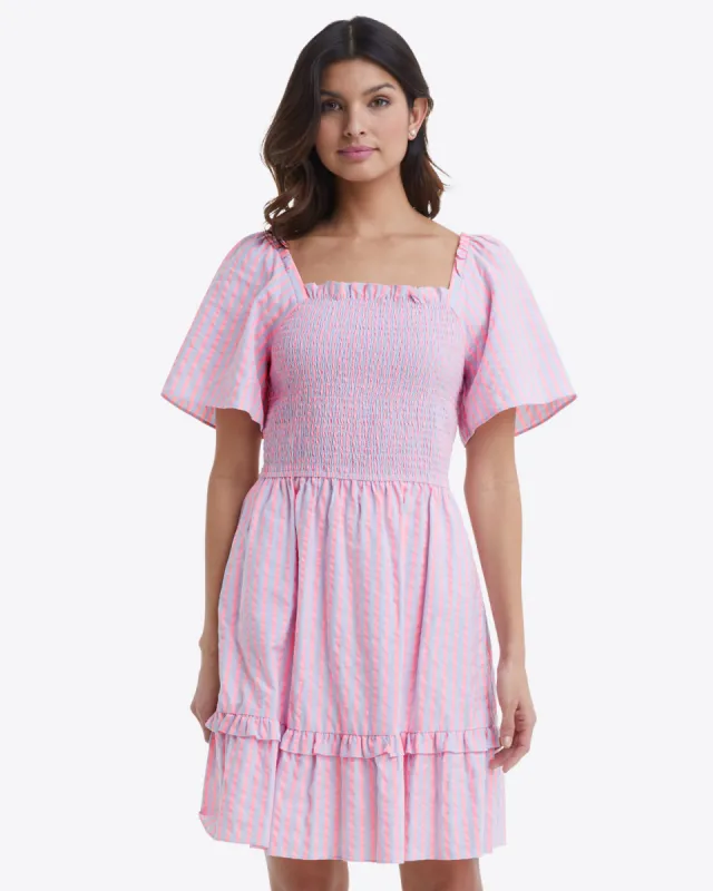 Goldie Smocked Dress in Seersucker Stripe sold by Draper James
