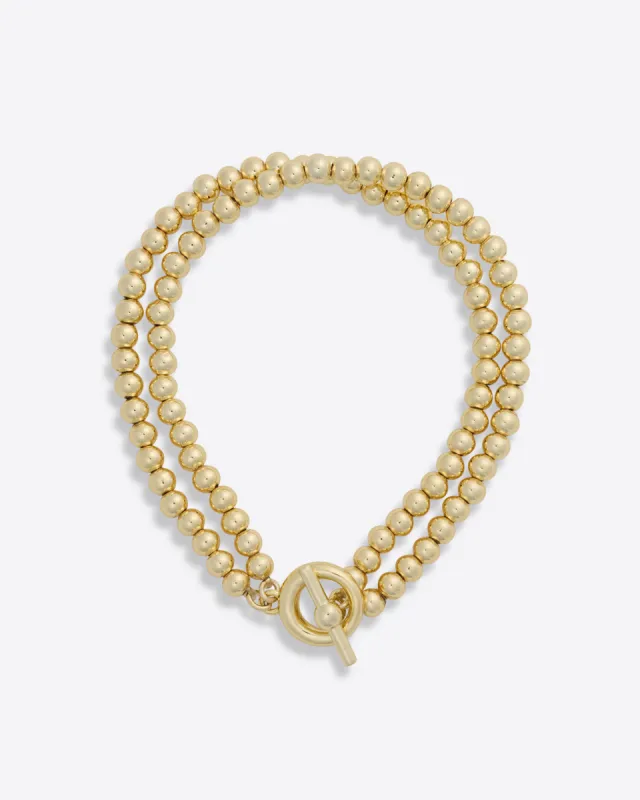Gold Bead Stretch Bracelet sold by Draper James