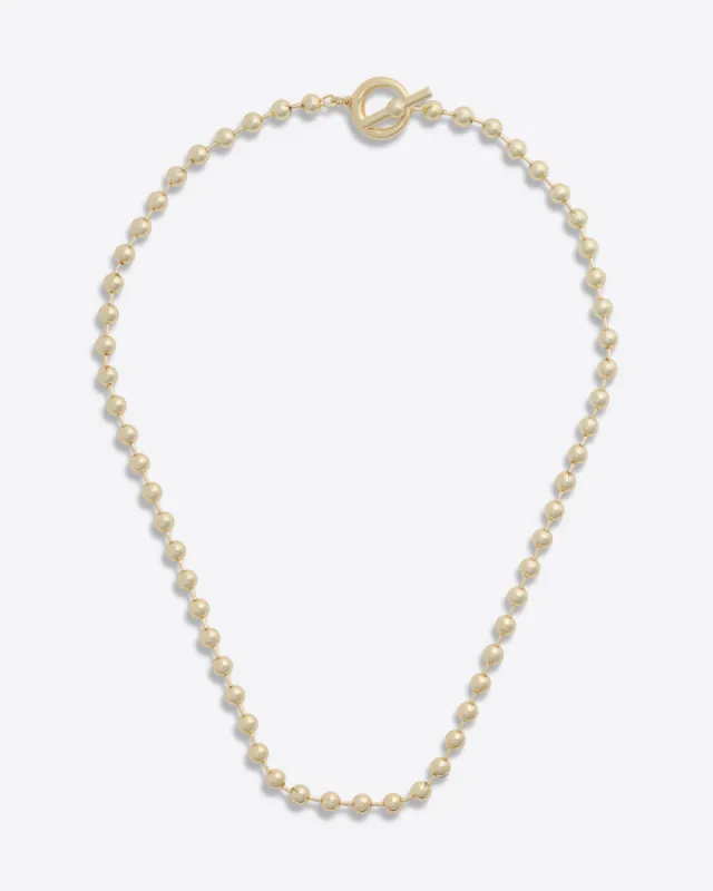 Gold Bead Toggle Necklace sold by Draper James