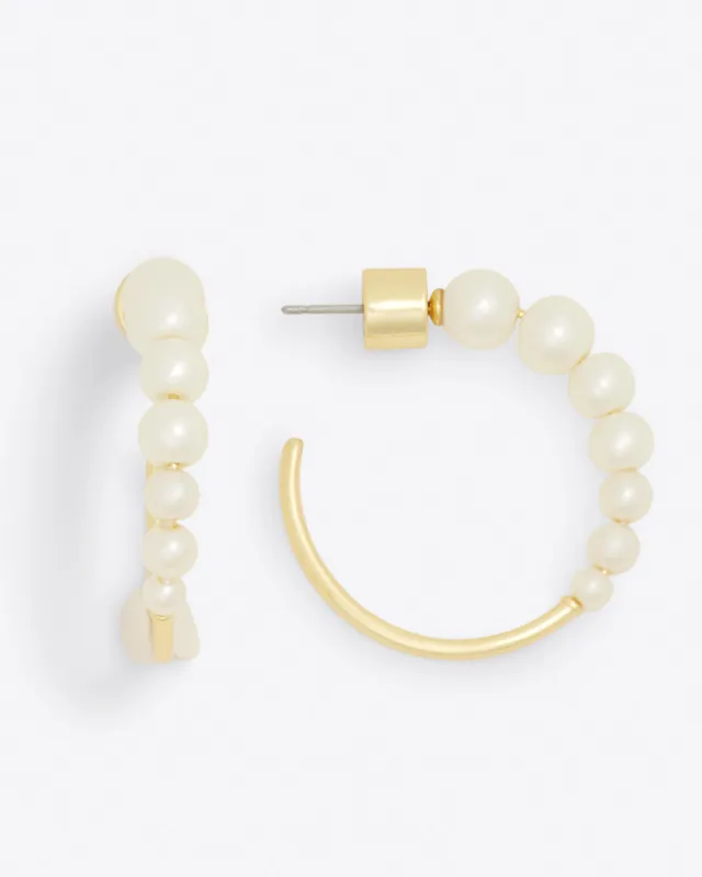 Pearl Hoops sold by Draper James