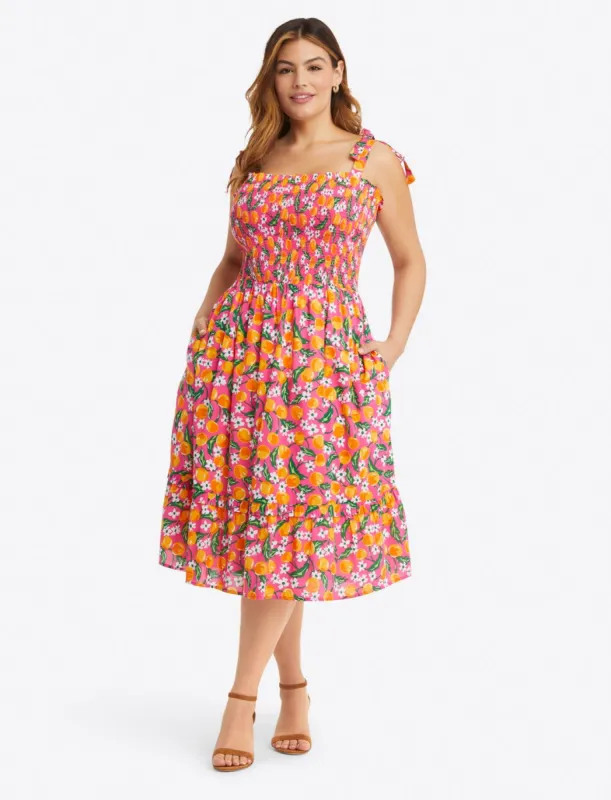Taylor Smocked Dress in Orange Blossom sold by Draper James