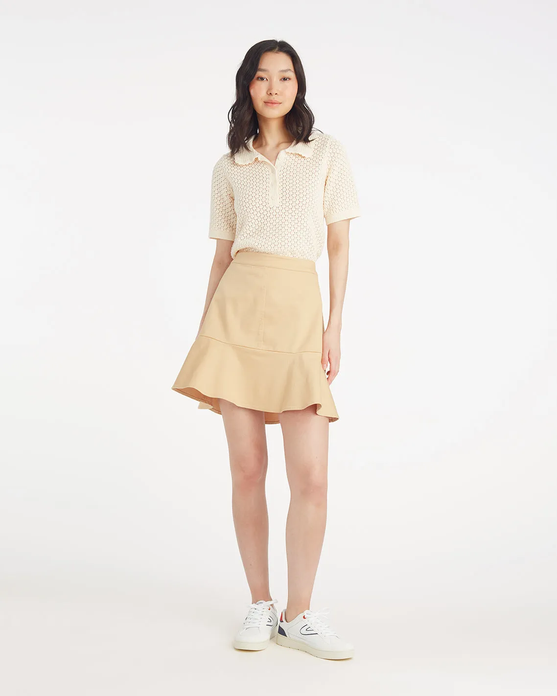 Peplum Mini Skirt in Croissant sold by Draper James