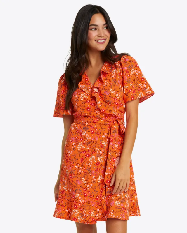 Reba Wrap Dress in Apricot Pansy Floral sold by Draper James