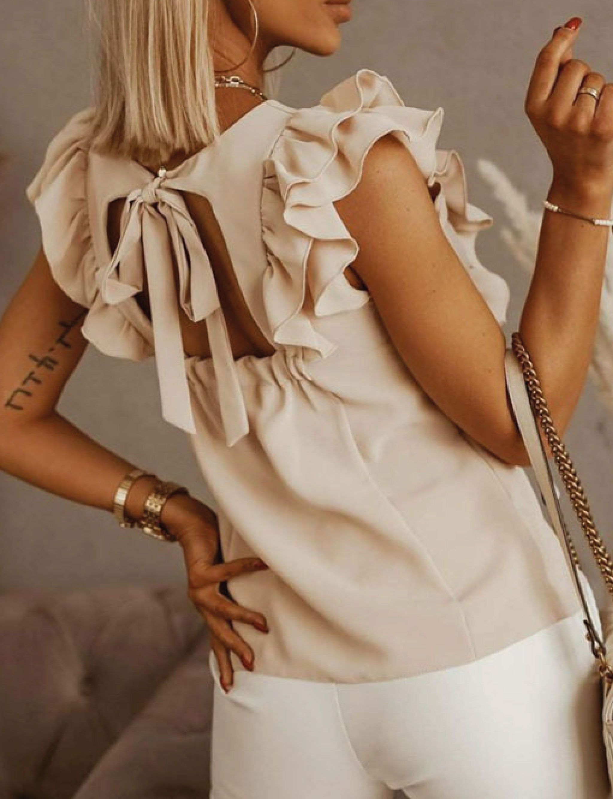 Orchid Ruffle Top sold by Dress Barn