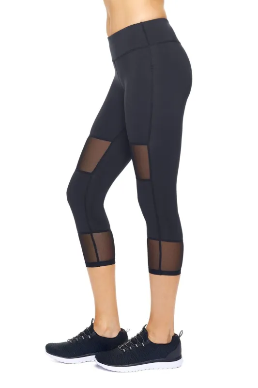 Airstretch Mid-Rise Double Mesh Panel Capri Leggings with Pocket - Plus sold by Dress Barn
