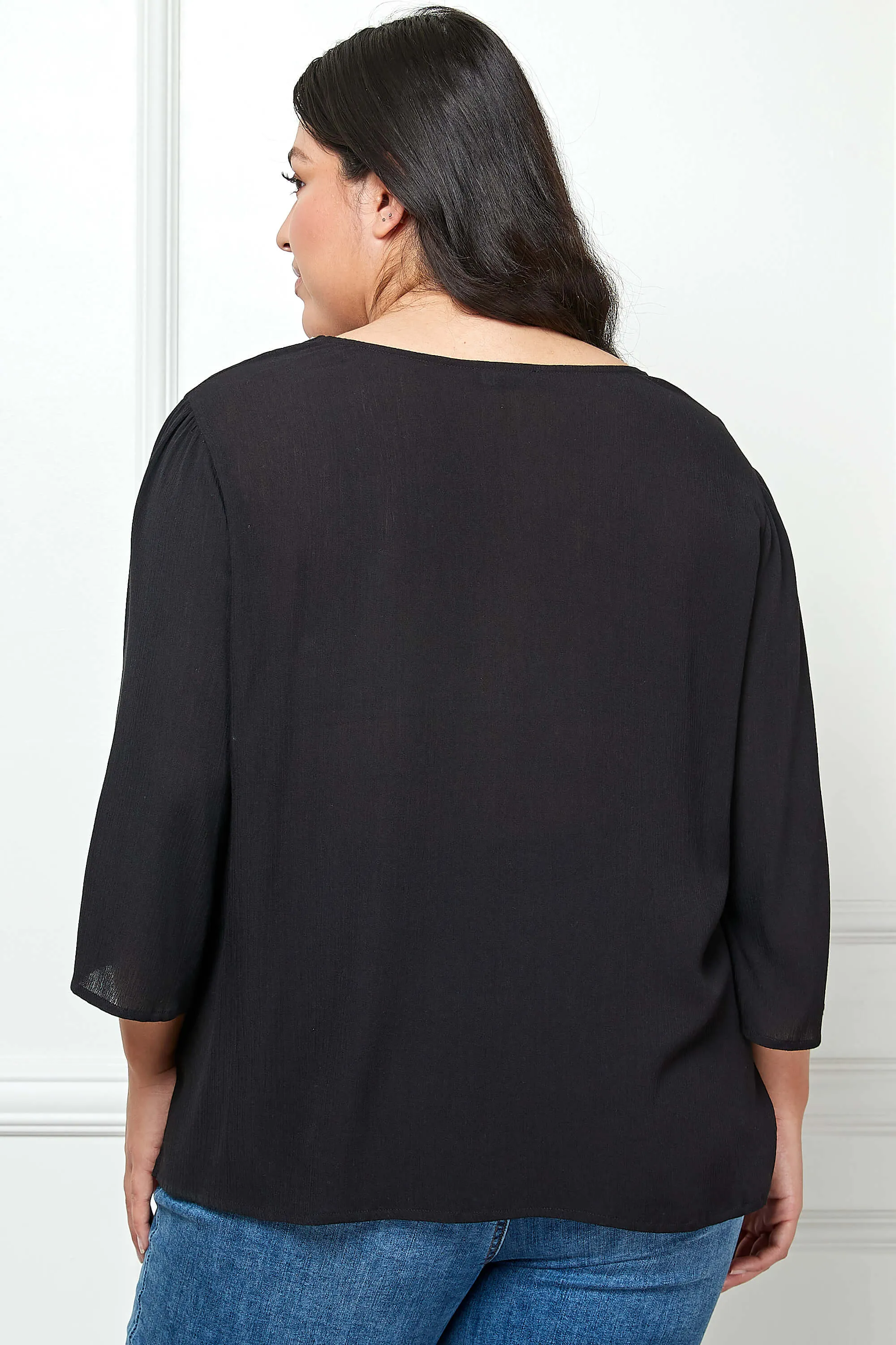 Roz and Ali 3/4 Flare Sleeve Embroidered Yoke Tunic in Black - Plus sold by Dress Barn product image thumbnail 4