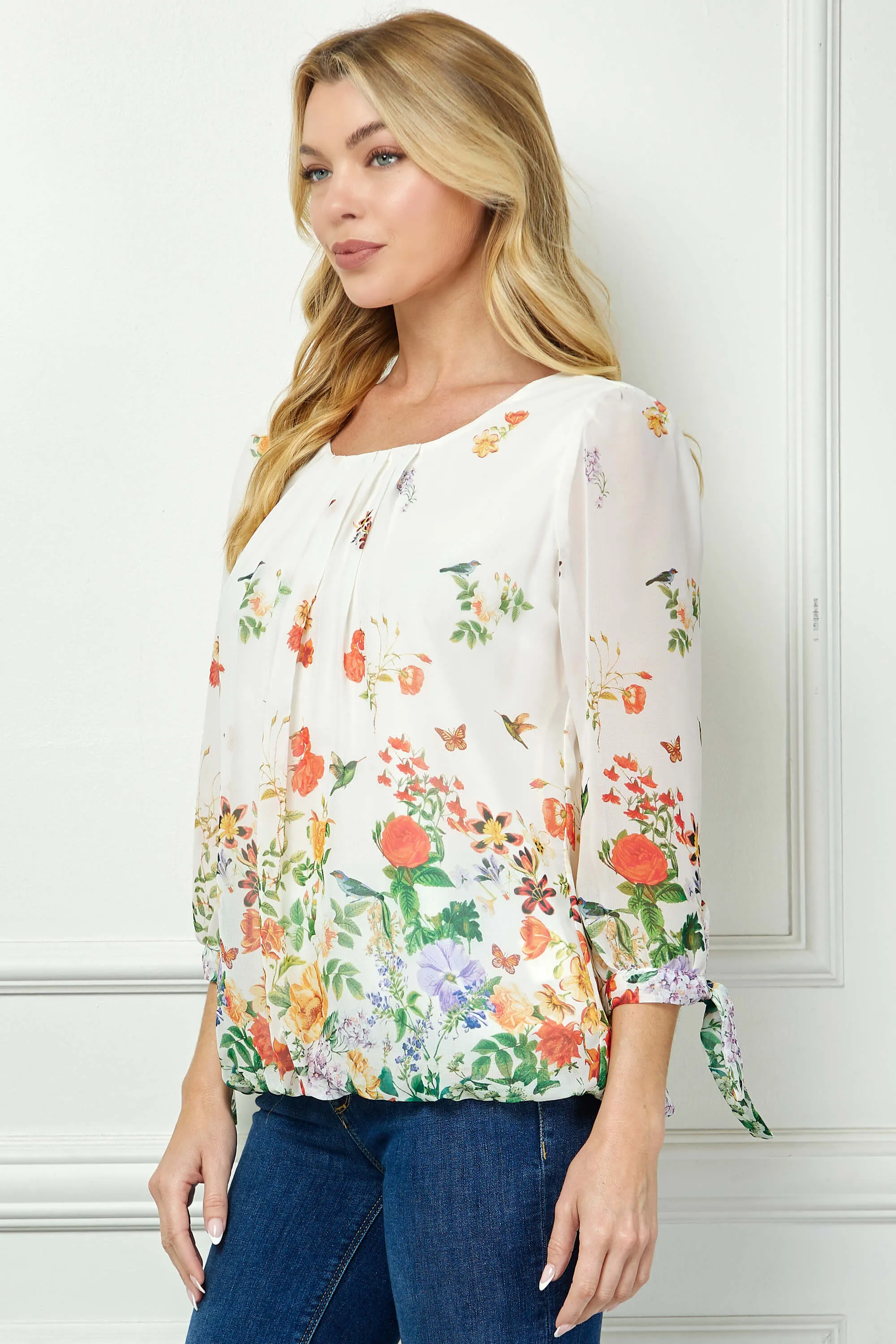 3/4 Tie Sleeve Pleat Neck Border Print Bubble Blouse in Ivory/Coral/Green sold by Dress Barn product image thumbnail 3
