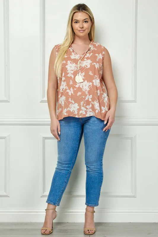 Sleeveless Ruffle Split Neck Tassel Blouse in Coral - Plus sold by Dress Barn