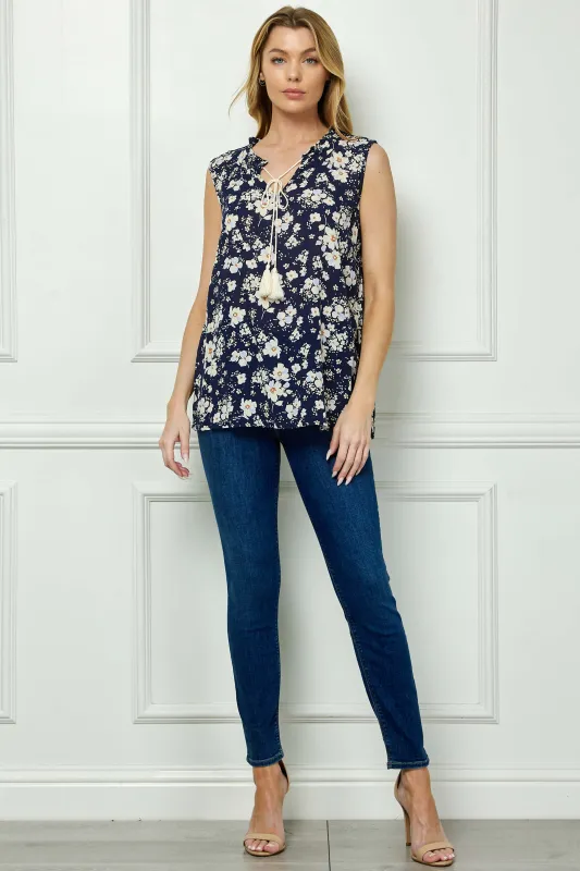 Sleeveless Ruffle Split Neck Tassel Blouse in Navy sold by Dress Barn