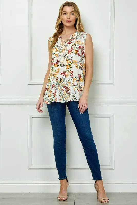 Sleeveless Ruffle Neck Tassel Blouse in Ivory made by Dress Barn