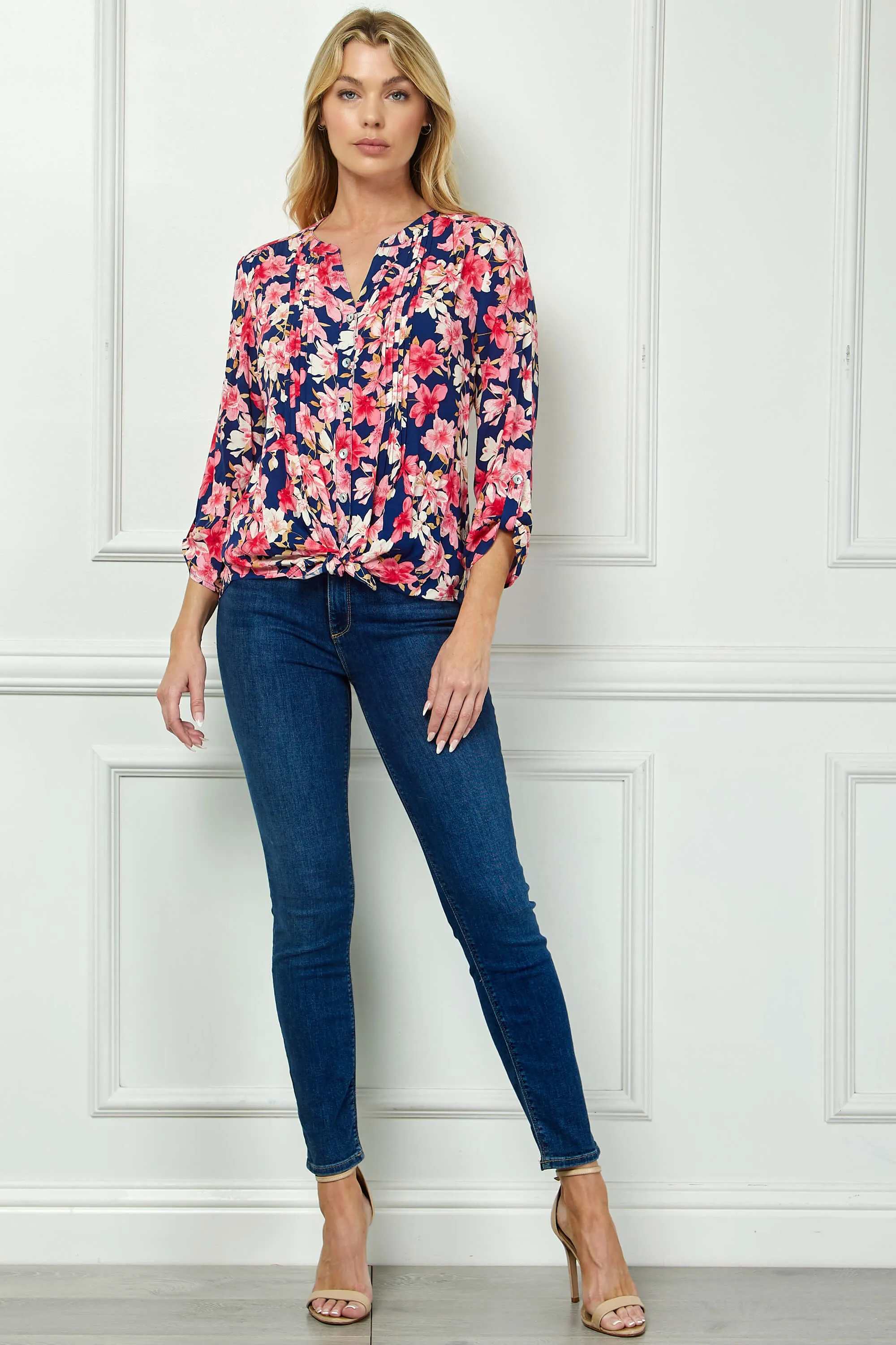 3/4 Button Tab Sleeve Pintuck Tie Front Blouse in Navy/Coral sold by Dress Barn