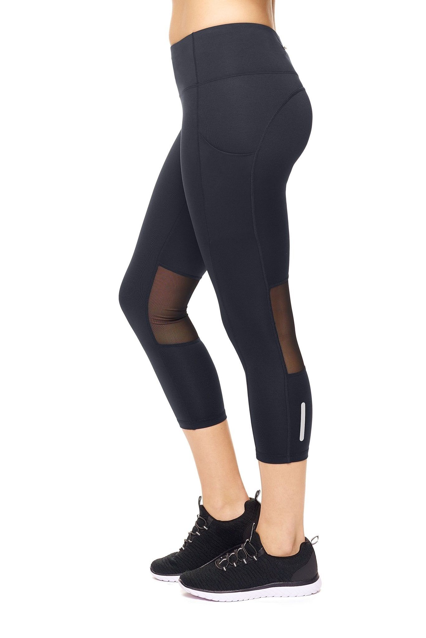 Airstretch Mid-Rise Mesh Panel Capri Leggings with Pocket - Plus sold by Dress Barn