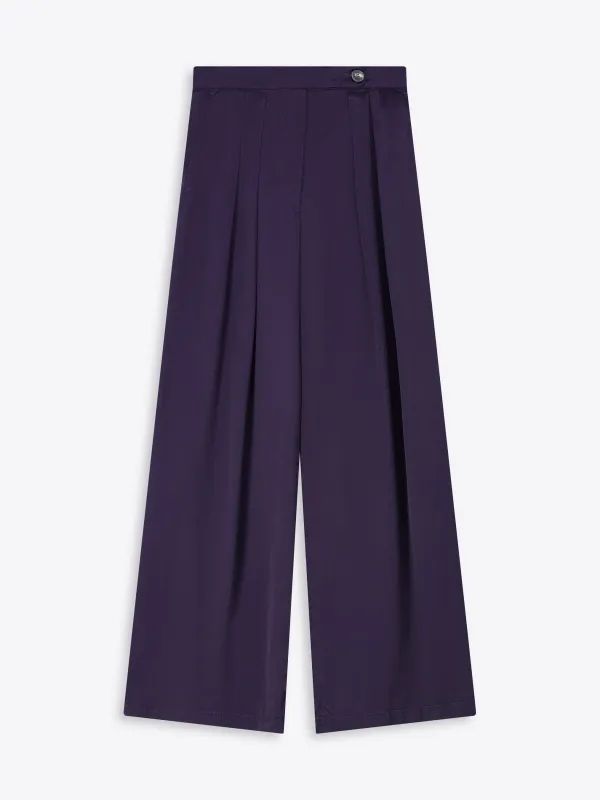 Wide pleated pants sold by Dries Van Noten