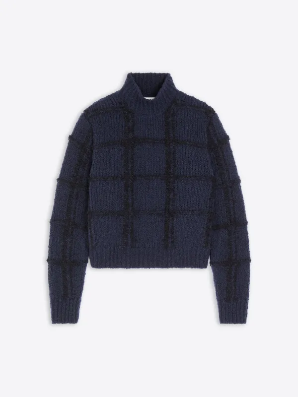 Textured wool sweater sold by Dries Van Noten