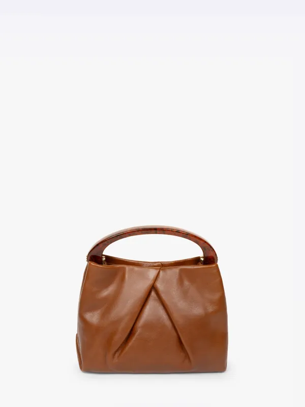Small pleated leather bag sold by Dries Van Noten
