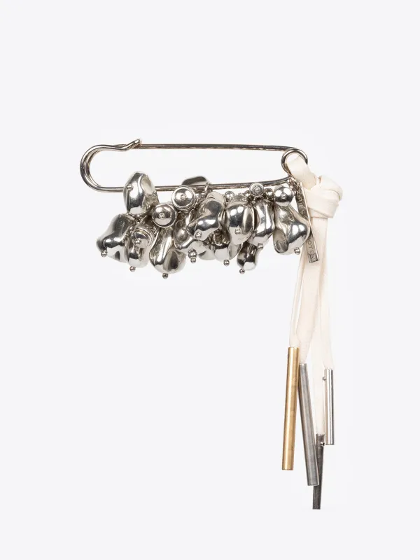 Large embellished pin keychain sold by Dries Van Noten