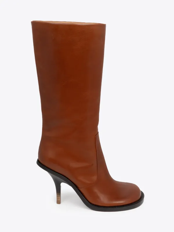 Round-toe leather boots sold by Dries Van Noten